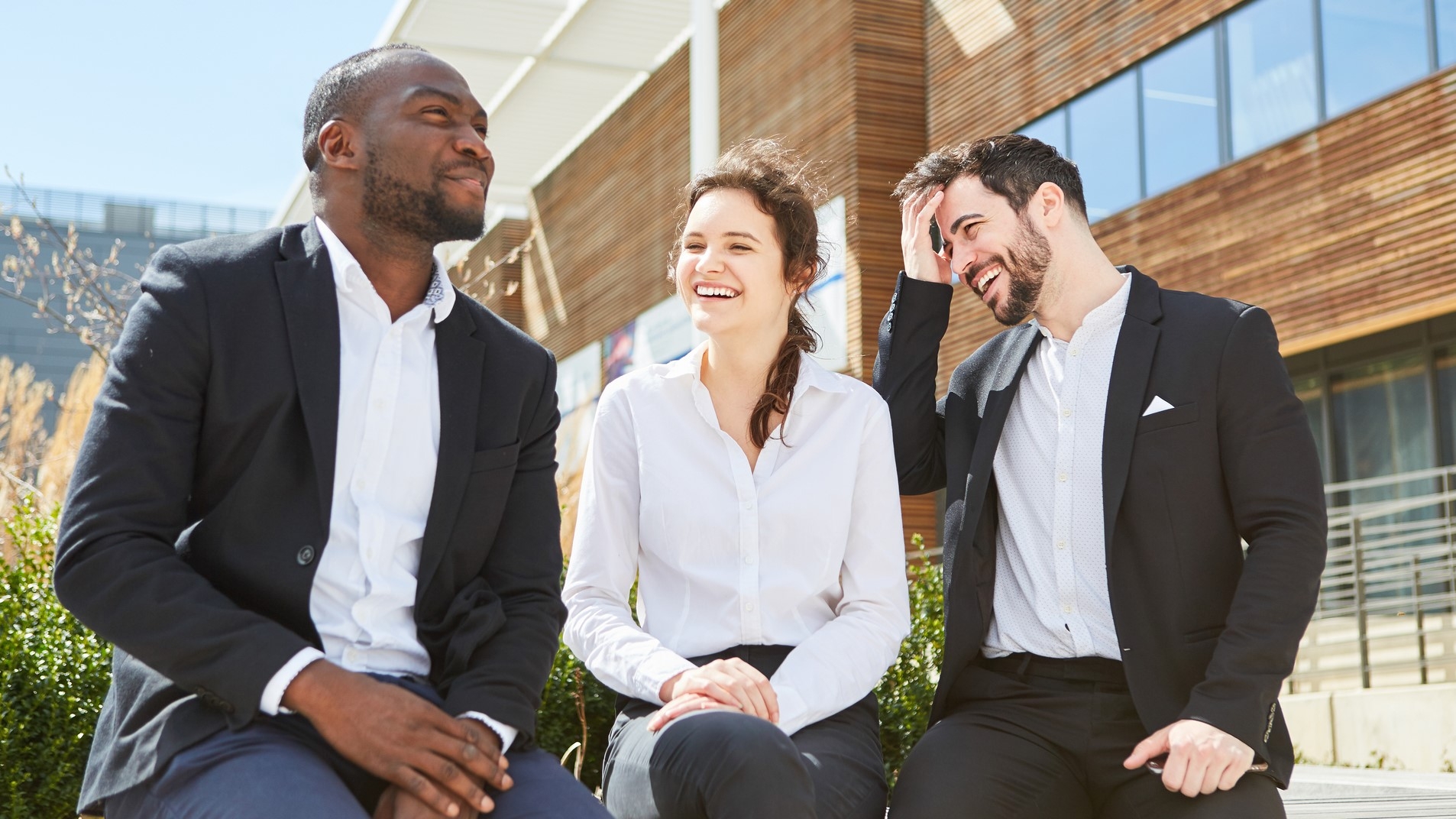 Group of professional peers talking and networking